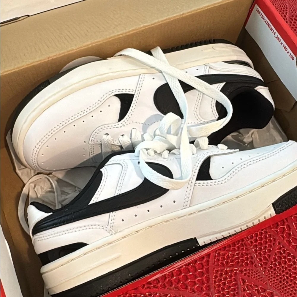 Nike Kids Black and White Sneakers shoes.
